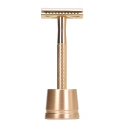Vista delantera del maquinilla de afeitar metal |oro rosa en stock